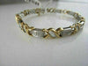 ESTATE WIDE 14KT TWO TONE 3.45CTW DIAMOND LOVE BRACELET