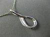 ESTATE .03CT DIAMOND 14KT WHITE GOLD 3D LOVE KNOT SEMI INFINITY FLOATING PENDANT