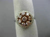 WIDE .97CT WHITE & PINK DIAMOND 18KT WHITE & ROSE GOLD CLUSTER HALO FLOWER RING