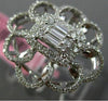 ESTATE LARGE .78CT ROUND & BAGUETTE DIAMOND 18KT WHITE GOLD FLOWER COCKTAIL RING