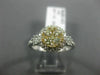 ESTATE WIDE .85CT WHITE & FANCY YELLOW DIAMOND 14K YELLOW GOLD HALO CLUSTER RING