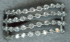 .83CT DIAMOND 14KT WHITE GOLD 3D MULTI ROW ROUND SHARED PRONG ANNIVERSARY RING