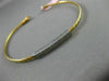 ESTATE .15CT DIAMOND 14KT TWO TONE GOLD ELONGATED PAVE FLEXIBLE BANGLE BRACELET
