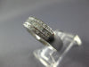 ESTATE LEVIAN .70CT DIAMOND 18KT WHITE GOLD 3D ROUND & BAGUETTE ANNIVERSARY RING