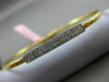 ESTATE .15CT DIAMOND 14KT TWO TONE GOLD ELONGATED PAVE FLEXIBLE BANGLE BRACELET