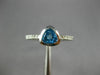 ESTATE .65CT DIAMOND & AAA TRILLION CUT BLUE TOPAZ 14K WHITE GOLD BEZEL FUN RING