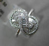 ESTATE .50CT ROUND & BAGUETTE DIAMOND 14KT WHITE GOLD FOREVER INFINITY LOVE RING