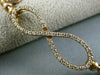 ESTATE .70CT DIAMOND 14KT ROSE GOLD 3D INFINITY FLEXIBLE LOVE BANGLE BRACELET
