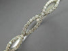 ESTATE WIDE 1.02CT DIAMOND 14K WHITE GOLD INFINITY SEMI ETERNITY BANGLE BRACELET