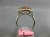 ESTATE WIDE .99CT WHITE & PINK DIAMOND 18KT WHITE & ROSE GOLD CIRCULAR FUN RING