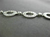 ESTATE 2.12CT DIAMOND 18KT WHITE GOLD CIRCULAR OVAL BY THE YARD TENNIS BRACELET