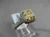 ESTATE 2.26CTW GIA FANCY YELLOW DIAMOND 18KT WHITE GOLD HALO ENGAGEMENT RING