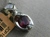 ESTATE .85CT DIAMOND & PINK SAPPHIRE 14KT WHITE GOLD SEMI BEZEL X LOVE PENDANT