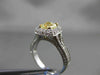 ESTATE 1.89CT GIA FANCY YELLOW DIAMOND 18KT WHITE GOLD HALO ENGAGEMENT RING