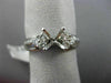 ESTATE .92CT DIAMOND ROUND & BAGUETTE 18KT WHITE GOLD SEMI MOUNT ENGAGMENT RING