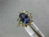 1.83CT DIAMOND & AAA OVAL TANZANITE 14KT YELLOW GOLD FLOWER HALO ENGAGEMENT RING