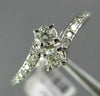ESTATE .50CT ROUND DIAMOND 14KT WHITE GOLD 2 STONE CLASSIC CRISS CROSS LOVE RING