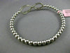 ESTATE .70CT DIAMOND 14KT WHITE GOLD 3D INFINITY FLEXIBLE LOVE BANGLE BRACELET