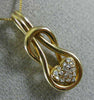 ESTATE .25CT DIAMOND 14KT YELLOW GOLD HEART LOVE KNOT INFINITY FLOATING PENDANT