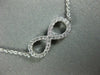 ESTATE .40CT DIAMOND 18KT WHITE GOLD 3D CLASSIC INFINITY LOVE NECKLACE