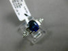 2.27CT ROUND & EMERALD DIAMOND & SAPPHIRE 18KT WHITE GOLD OVAL ENGAGEMENT RING