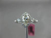 ESTATE .78CT WHITE & YELLOWW DIAMOND 18K WHITE GOLD CLASSIC HALO ENGAGEMENT RING