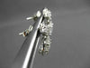 ESTATE 1.12CT ROUND DIAMOND 18KT WHITE GOLD FLOWER CLUSTER HANGING EARRINGS