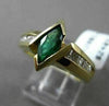 ESTATE 1.10CTW DIAMOND & AAA MARQUISE EMERALD 14KT YELLOW GOLD ENGAGEMENT RING