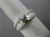 ESTATE .72CT DIAMOND 18KT WHITE GOLD ROUND & PRINCESS SEMI MOUNT ENGAGMENT RING