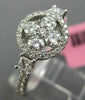 ESTATE WIDE .82CT DIAMOND 18K WHITE GOLD 3D ROUND FLOWER HALO FILIGREE LOVE RING