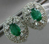 ESTATE 1.32CT DIAMOND & AAA EMERALD 14KT WHITE GOLD OVAL FLOWER HUGGIE EARRINGS