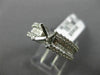 ESTATE .72CT DIAMOND 18KT WHITE GOLD ROUND & PRINCESS SEMI MOUNT ENGAGMENT RING