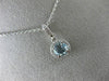 ESTATE .82CT DIAMOND & AAA AQUAMARINE 14K WHITE GOLD ROUND HALO FLOATING PENDANT