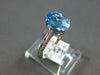 1.57CT DIAMOND & AAA BLUE TOPAZ 18KT WHITE GOLD OVAL & ROUND FILIGREE LOVE RING