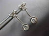 ANTIQUE .64CT DIAMOND 18KT WHITE GOLD CLASSIC SOLITAIRE HANGING EARRINGS #11366