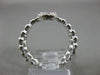 ESTATE .64CT DIAMOND 14KT WHITE GOLD CLUSTER OVAL CRISS CROSS X FRIENDSHIP RING