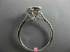 ESTATE LARGE .69CT ROUND & BAGUETTE DIAMOND 18KT WHITE GOLD OVAL ENGAGMENT RING