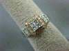 WIDE .50CT ROUND & BAGUETTE DIAMOND 14KT WHITE & ROSE GOLD HALO ENGAGEMENT RING