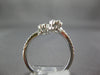 ESTATE WIDE .47CT DIAMOND 18KT WHITE GOLD CLUSTER DOUBLE FLOWER CRISS CROSS RING