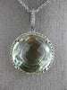ESTATE EXTRA LARGE 1.13CT DIAMOND & GREEN AMETHYST 14KT WHITE GOLD HALO PENDANT