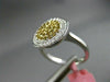 ESTATE WIDE .61CT FANCY DIAMOND 18KT TWO TONE GOLD 3D PAVE CIRCULAR CLASSIC RING