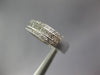 ESTATE LEVIAN .70CT DIAMOND 18KT WHITE GOLD 3D ROUND & BAGUETTE ANNIVERSARY RING