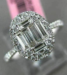 ESTATE LARGE .69CT ROUND & BAGUETTE DIAMOND 18KT WHITE GOLD OVAL ENGAGMENT RING