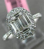 ESTATE LARGE .69CT ROUND & BAGUETTE DIAMOND 18KT WHITE GOLD OVAL ENGAGMENT RING