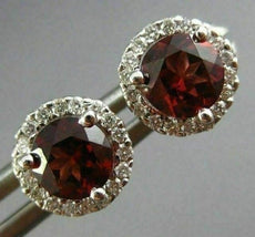 ESTATE 1.17CT DIAMOND & AAA GARNET 14KT WHITE GOLD ROUND HALO STUD EARRINGS