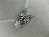 ESTATE .15CT DIAMOND 14K WHITE GOLD 3D DANCING DIAMOND XO FLOATING LOVE NECKLACE
