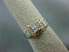 WIDE .50CT ROUND & BAGUETTE DIAMOND 14KT WHITE & ROSE GOLD HALO ENGAGEMENT RING