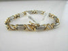 ESTATE WIDE 14KT TWO TONE 3.45CTW DIAMOND LOVE BRACELET