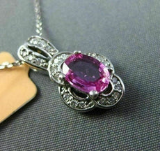 ESTATE .97CT DIAMOND & AAA PINK SAPPHIRE 14KT WHITE GOLD FLOWER FLOATING PENDANT