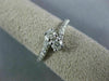 ESTATE .50CT ROUND DIAMOND 14KT WHITE GOLD 2 STONE CLASSIC CRISS CROSS LOVE RING
